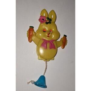 Vintage Yellow Lucite Plastic baby girl bunny Pin Carrots Movable Eyes Arms